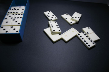 Dominoes on a black background