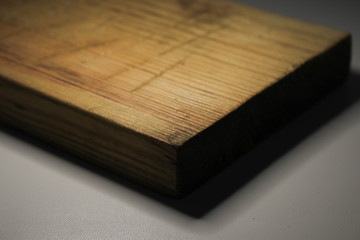Old wooden board on a gray background