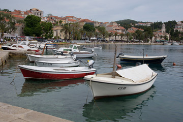 Fototapeta na wymiar Pier and sea in Cavtat or Ragusavecchi, city located in Dalmatia, on the Adriatic Sea coast, Croatia, Europe