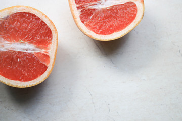 Grapefruit halves on the table
