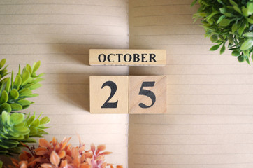 October 25, Appointment date with number cube design for background.