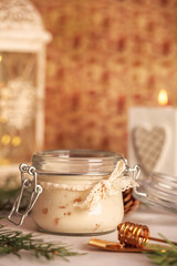 Sweet homemade nougat and honey with nuts in vintage style on a light background for Christmas and new year