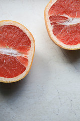 Grapefruit halves on the table