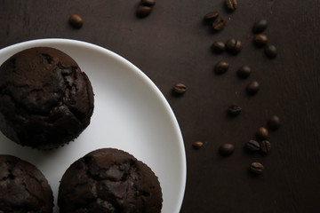 Chocolate cupcakes on a white plate