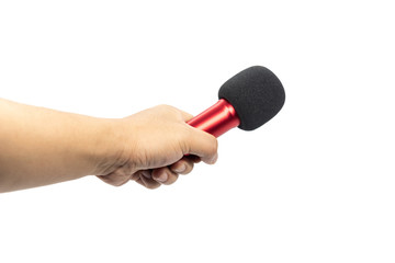 One hand holding a small red microphone