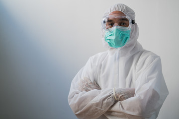 Fototapeta premium Medical staff wearing face shield and medical mask for protect coronavirus covid-19 and PPE suit for Coronavirus outbreak or Covid-19..