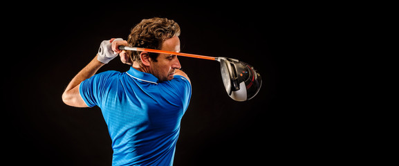 Portrait of a golf player perfecting the swing isolated on dark background, banner image - obrazy, fototapety, plakaty