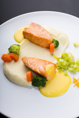 Fried salmon fillet with vegetables