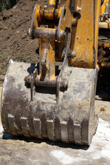  construction site excavator bucket close-up                              