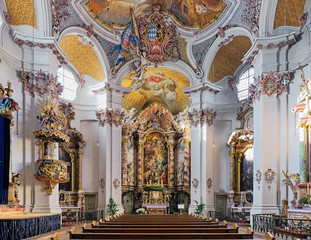 Fototapeta na wymiar Munich, Germany. Interior of abbey church of St. Anna im Lehel. The church was built in 1727-1733 by Johann Michael Fischer. Interior was completed in 1737 by Asam brothers and Johann Baptist Straub.