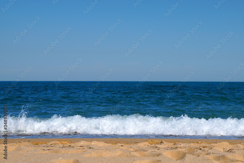 Wall mural empty beach in the summer - sea, sand, white waves