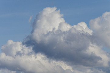 different shapes of clouds in the blue sky. cloud background.