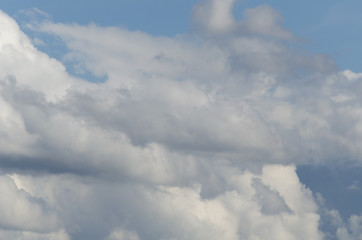 different shapes of clouds in the blue sky. cloud background.