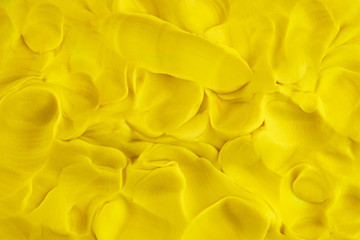 Play clay yellow background texture