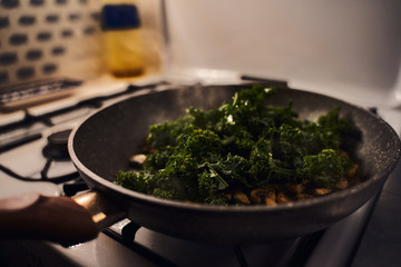 Pam-fried kale and mushrooms with turmeric
