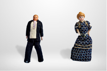 Vintage dolls, man in dark suit and woman in long dress