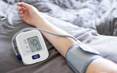 Measuring blood pressure at home with portable device, health check