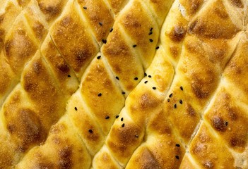 fresh baked bread isolated on yellow background