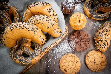 Fresh bakery, sliced bread on a wooden backround