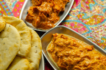 Chicken Madras and Chicken Tikka Masala with Pilau Rice, Naan Breads and, Onion Bhajis
