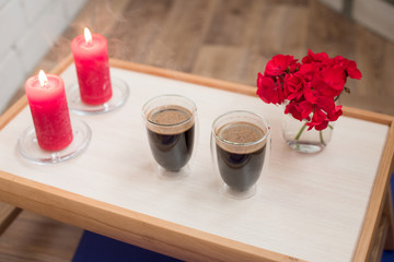 Transparent double wall glass mug with espresso coffee