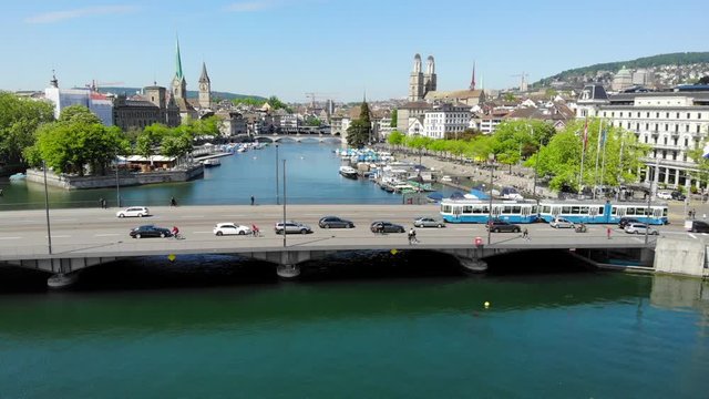 Beautiful Birdview Drone Shot of Quad Bridge over Limmat River in Z&uuml;rich Switzerland - Moving Backwards Shot Revealing Surroundings