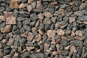 Gravel wrapped in steel mesh, texture for your background.