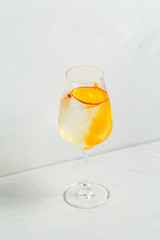 Cool refreshing cocktail with orange lemon zest