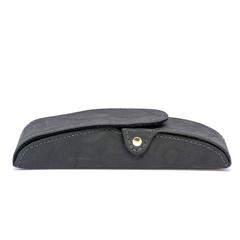 Genuine leather glasses case on white background isolated