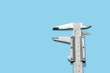 caliper on the blue background copyspace