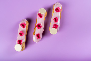 French rose strawberry eclair sweet dessert. Minimalist conceptual design, flat lay with space