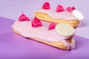 French rose strawberry eclair sweet dessert. Minimalist conceptual design, flat lay with space