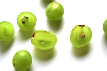 Green grapes on a white background. Fresh grapes