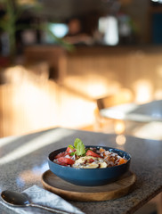 smoothie bowl with fruits on the table