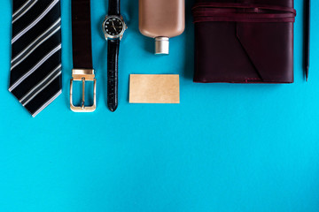 Set of stylish men's accessories and and card on a blue background. Happy father's day. 19 june. Copy text.