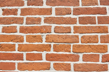 Background of brick wall with concrete