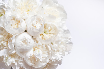 White peony bouquet top view with copy space on the right 