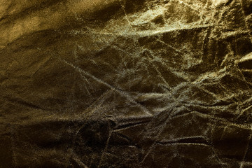 Fototapeta na wymiar Crumpled golden texture, crumpled golden abstract background