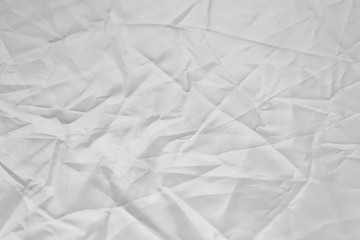 Crumpled white texture, crumpled white fabric, abstract background