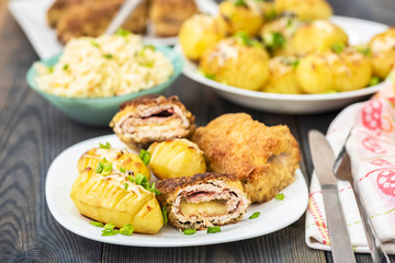 Cutlet cordon bleu and hasselback potatoes