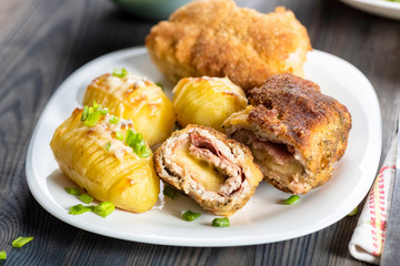 Cutlet cordon bleu and hasselback potatoes