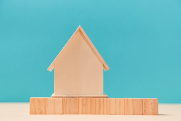 Empty wooden house with blank blocks for creative inscription, place for text. Mockup for creating design, copy space