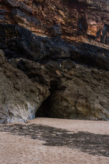 Beach of Nazare, Portugal. Cliff and sand