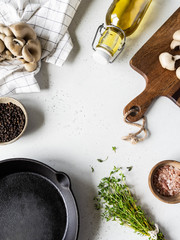 set of products and kitchen utensils for cooking fried oyster mushrooms with thyme. Top view