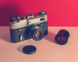 Old retro fotocamera in insta style. Vovrant colors. Lifestyle stock photo. For hipster post in sotial media