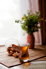 black tea on   table with breadcrumbs.