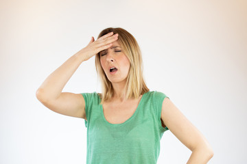 Beautiful woman making gesture with hands on head