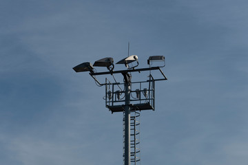 Specialized pole for lighting the ski slopes.