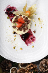 Limoncello mousse with cocoa almond cookies crumble.Traditional Italian pastry dessert vanilla cream