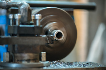 Lathe machine close up abstract background.
